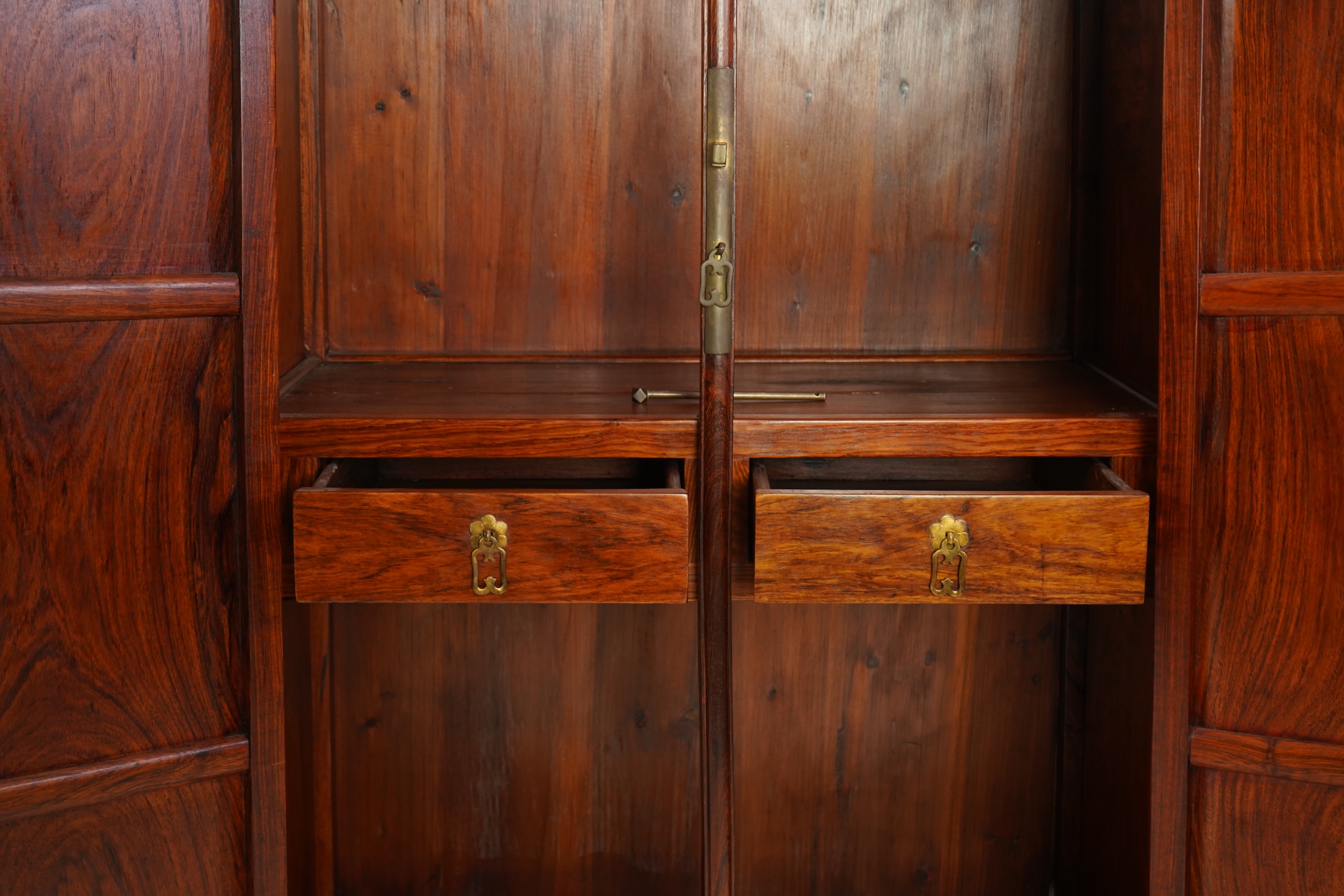 A Chinese huanghuali round-corner cabinet, yuanjiaogui, 19th/20th century